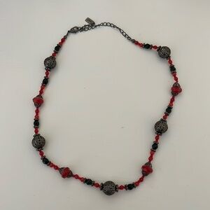 Black, red, and gray necklace.